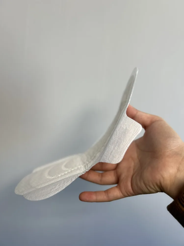 Sanitary pad shape and surface reference.