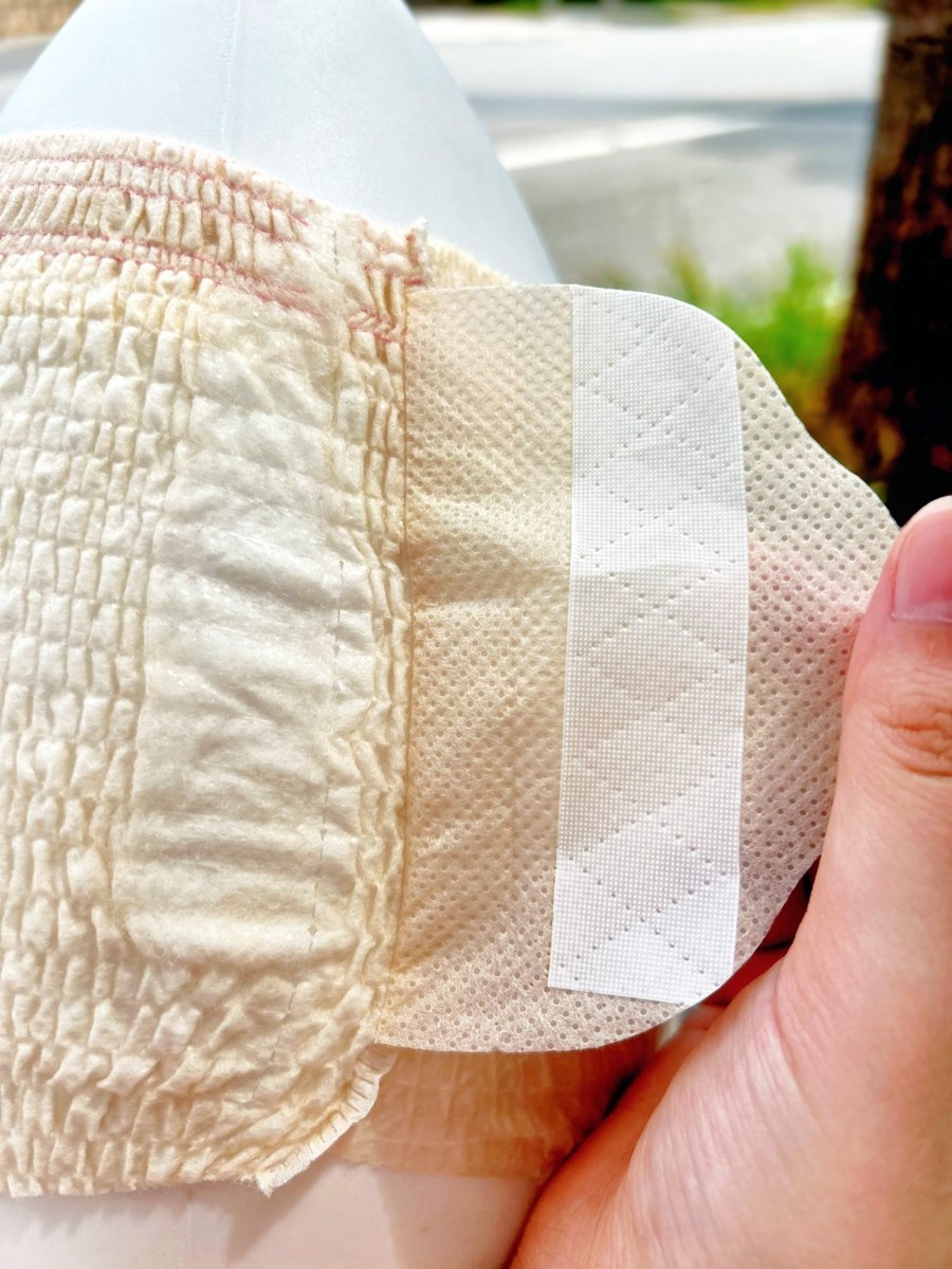 Actual side-tab detail: open and refasten.