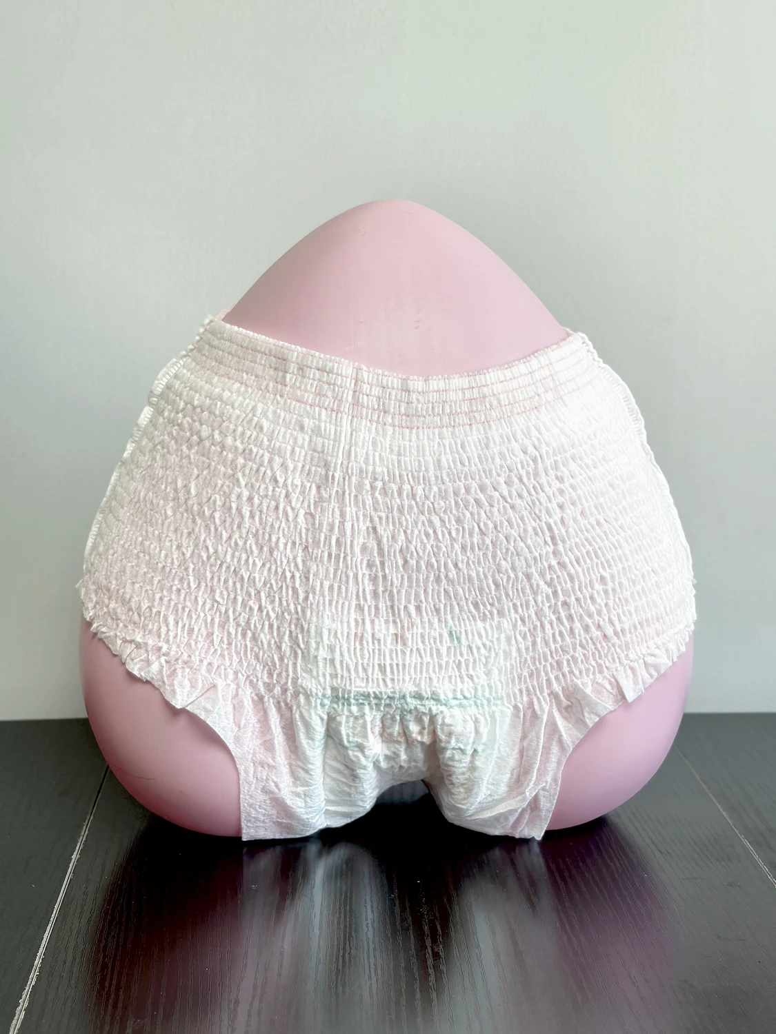 Actual L reference menstrual pants on a display form