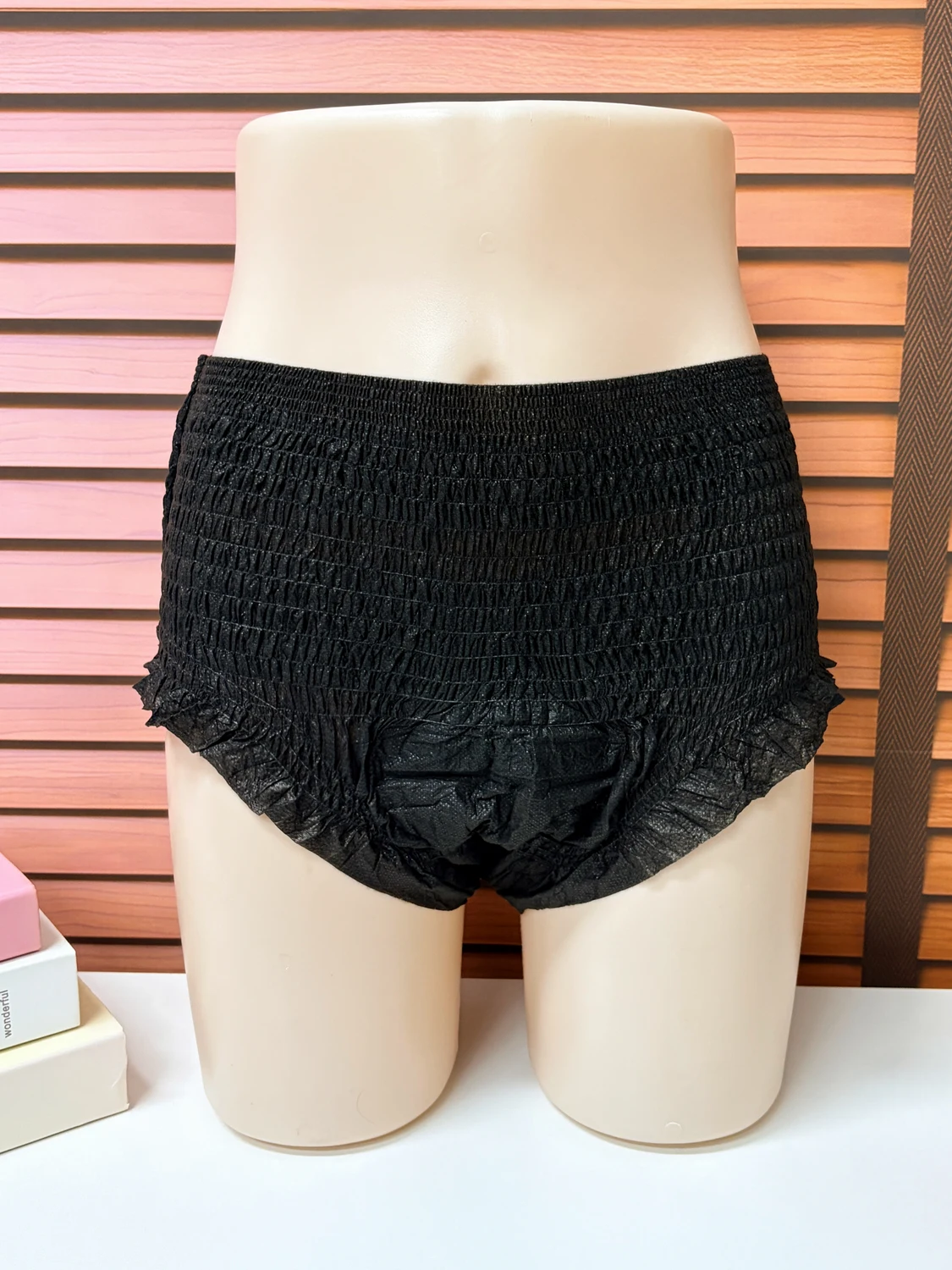 Black disposable menstrual pants reference sample - overall pull-up shape